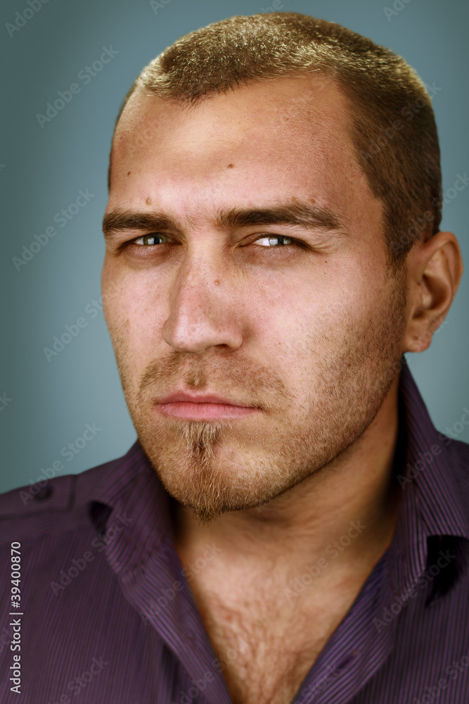 Obraz premium male portrait on a blue background