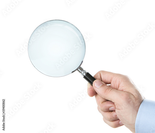 Hand holding magnifying glass with clipping path for the inside
