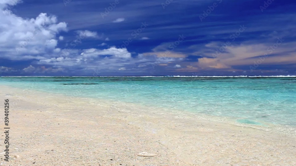 Waves on a deserted tropical beach