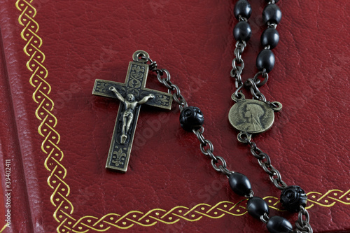 Rosary on a Bible