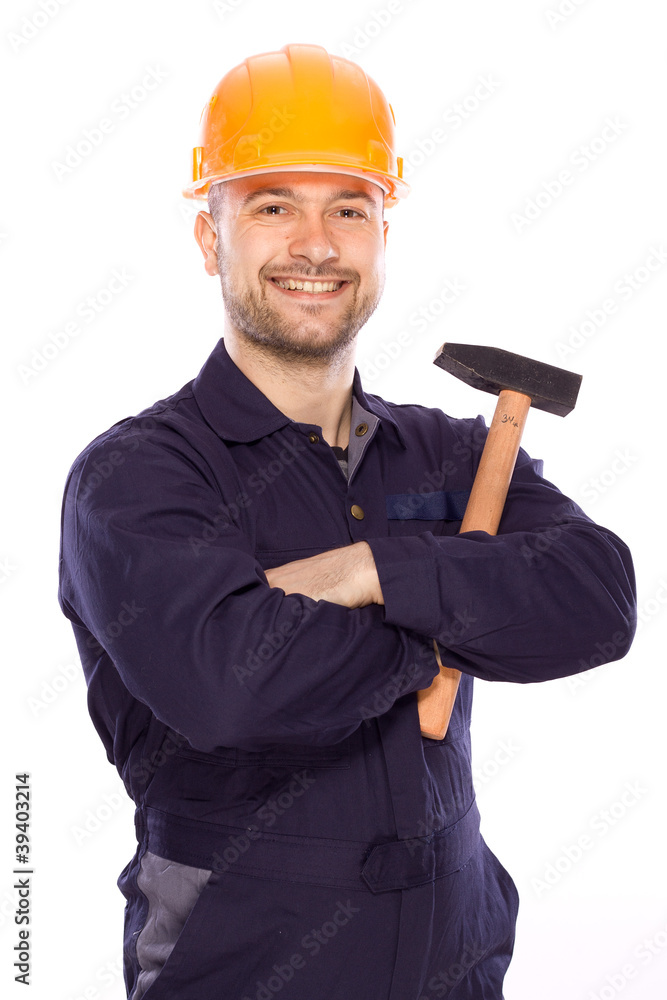 portrait of a young builder with the tools