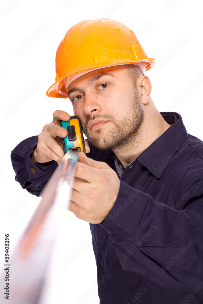 portrait of a young builder with the tools portrait of a young builder with the tools