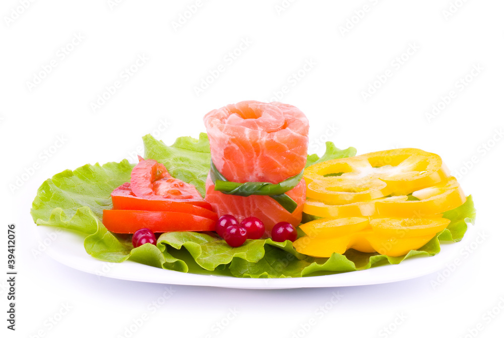 Tasty salmon rolls with mushroom, lemon and salad on the plate Tasty salmon rolls with mushroom, lemon and salad on the plate