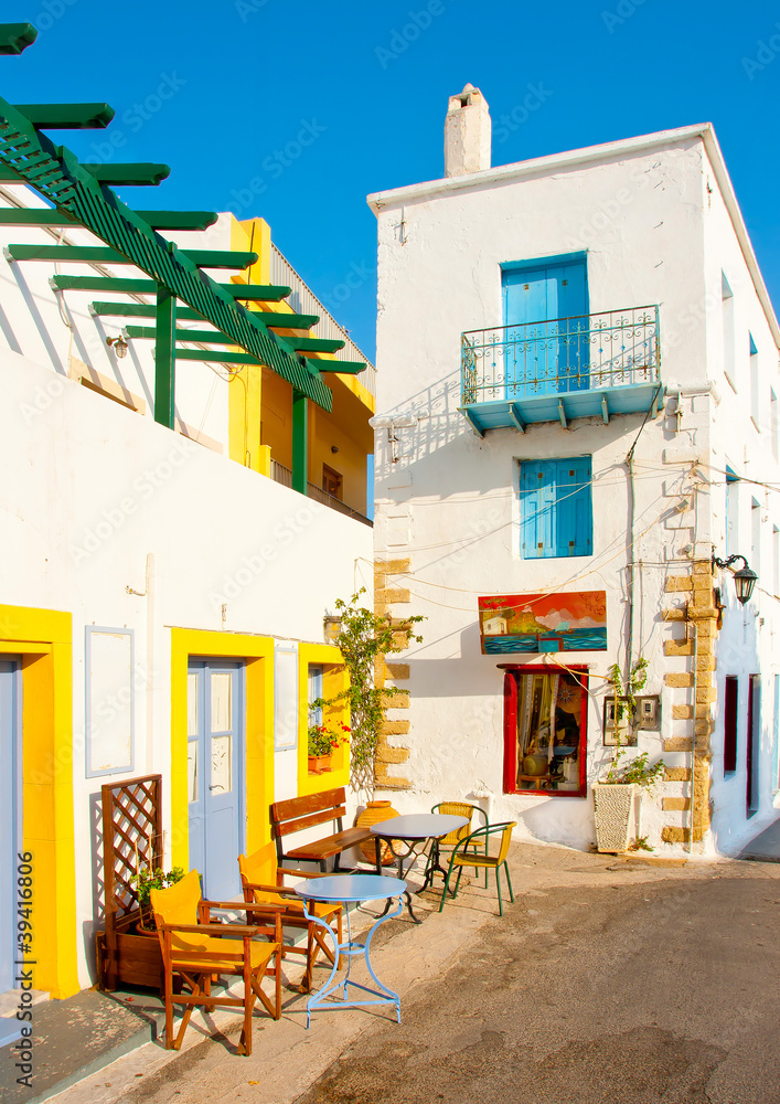 Old house with blue  windows in Kithira island Greece