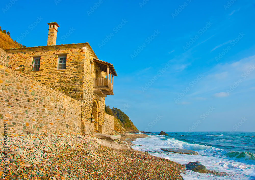 Old house by the sea near monatsery Iviron on Athos Greece