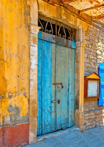 Blue colored door in a building located in Limassol Cyprus © imagIN photography