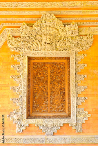 Balinese carving window in Batuan temple  Bali