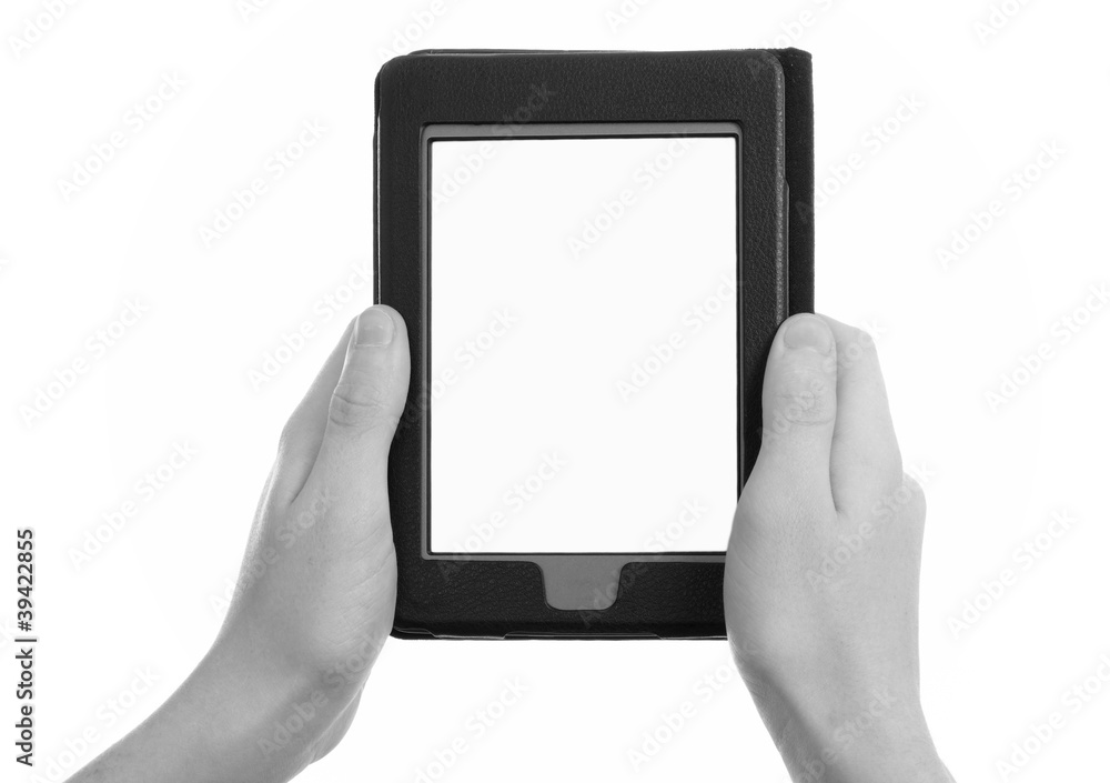 hands holding electronic e-reader, b&w tone hands holding electronic e-reader, b&w tone