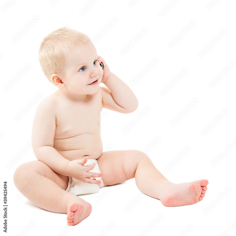 Cute baby boy is talking on cell phone Cute baby boy is talking on cell phone