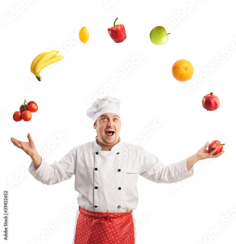funny cook juggles fruit and vegetables