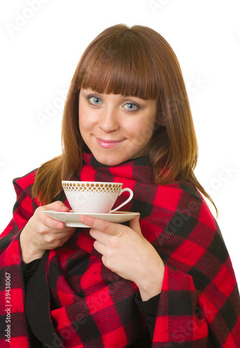 Beautiful young girl with a cup