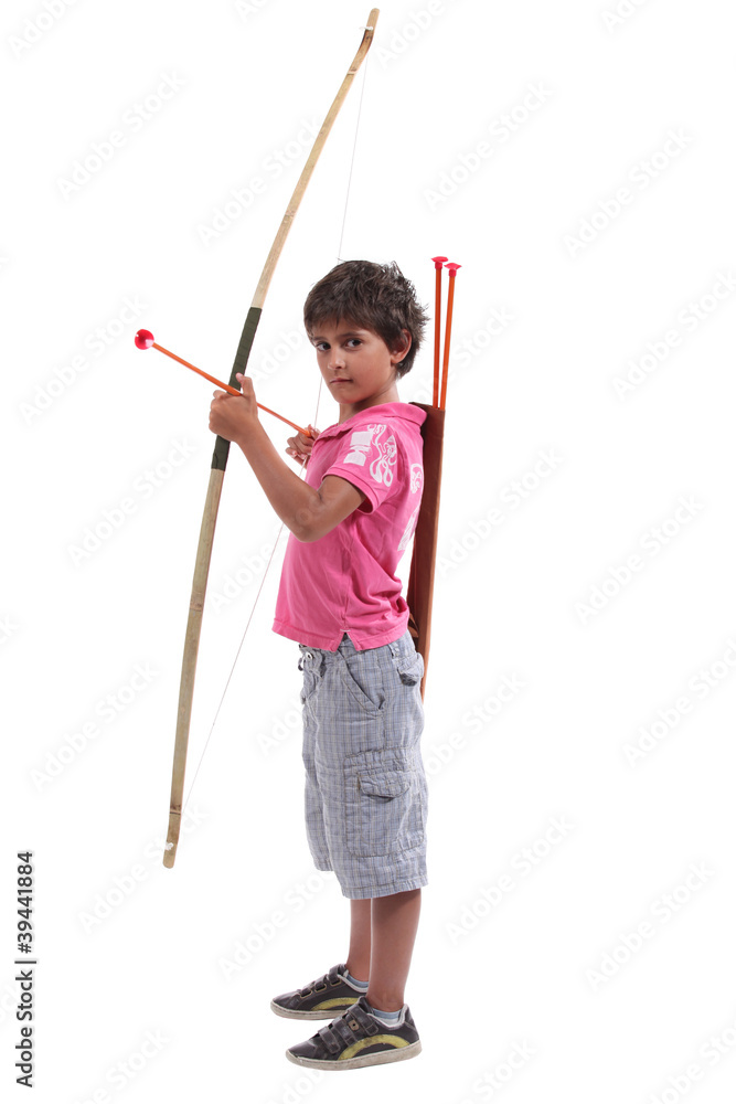 Young boy with a large bow and arrow Young boy with a large bow and arrow