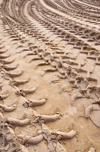 Background mark truck wheels sand human footprint
