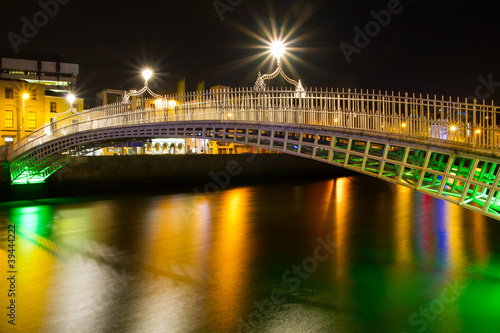 The ha'penny bridge in Dublin at night, Ireland photo