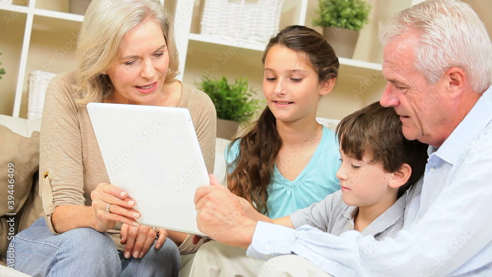 Family Generations Using Laptop Computer Family Generations Using Laptop Computer