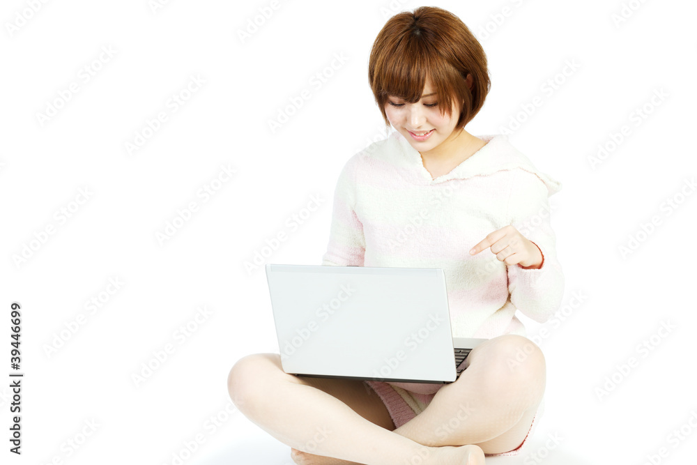 Beautiful asian woman using a laptop computer Beautiful asian woman using a laptop computer