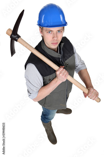 Tradesman holding a pickaxe