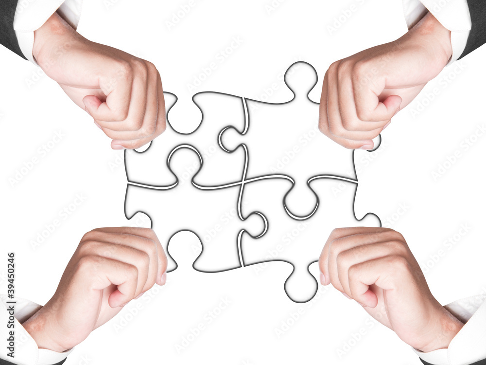 Business hands and puzzle isolated on white background Business hands and puzzle isolated on white background