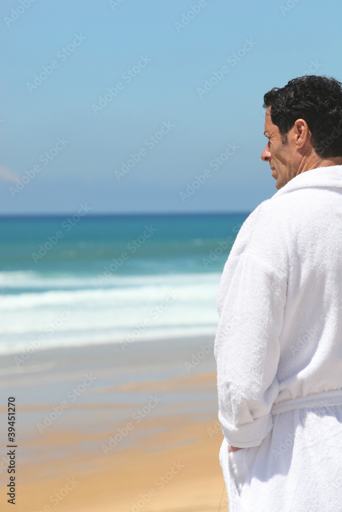Man standing by the sea