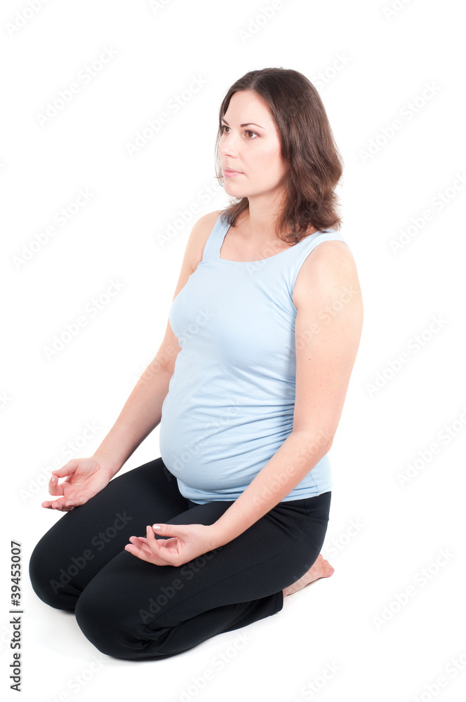 Portrait of pretty pregnant woman practicing yoga Portrait of pretty pregnant woman practicing yoga