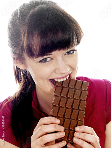 Young Woman Eating Chocolate. Model Released