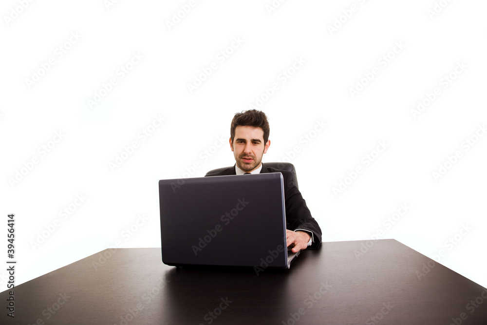 Portrait of happy business man with laptop at office desk Portrait of happy business man with laptop at office desk