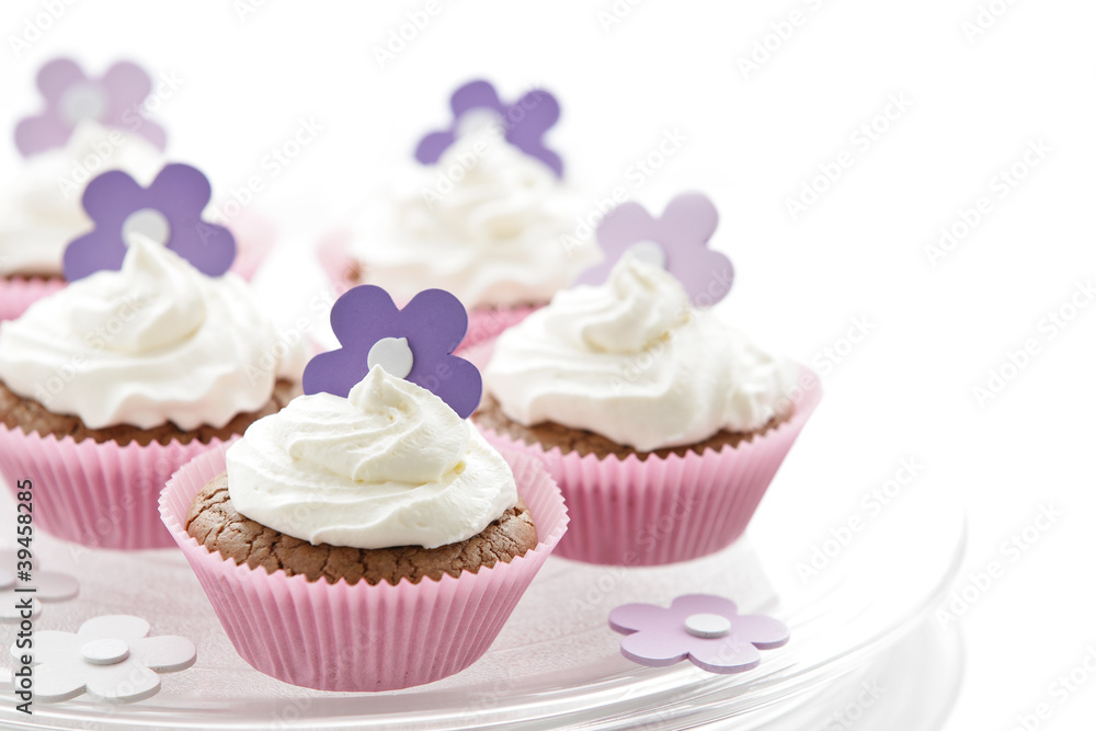 Delicious cupcakes with sweet cream