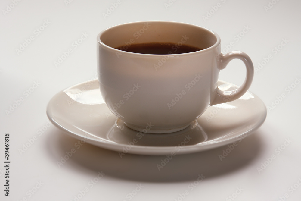 Closeup of a cup of coffee isolated on white Closeup of a cup of coffee isolated on white