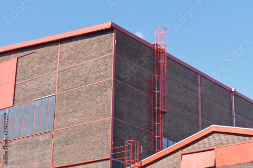 Facade from a big factory with nice red details