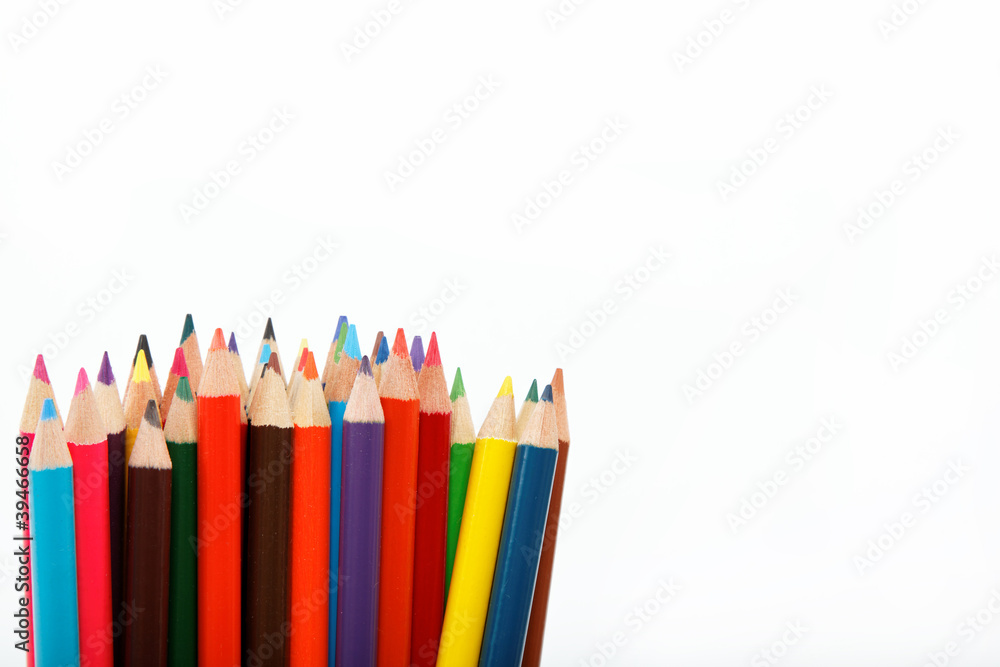Colored pencils on a white background. Colored pencils on a white background.