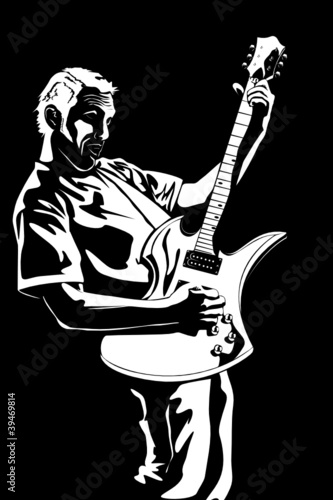 Portrait of the young man with a guitar