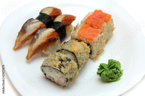 rolls and sushi on plate
