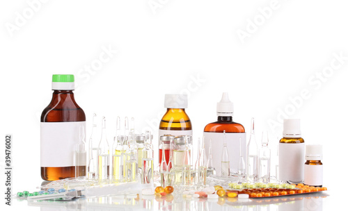 Medical bottles with syringe, medical ampoules and tablets