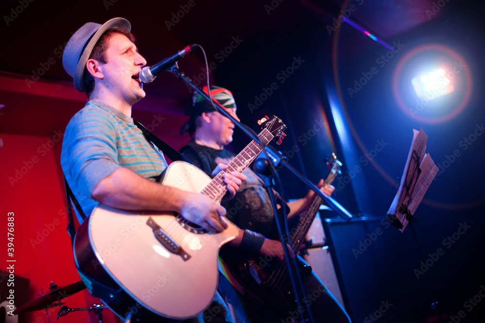 Fototapeta premium musician plays a guitar