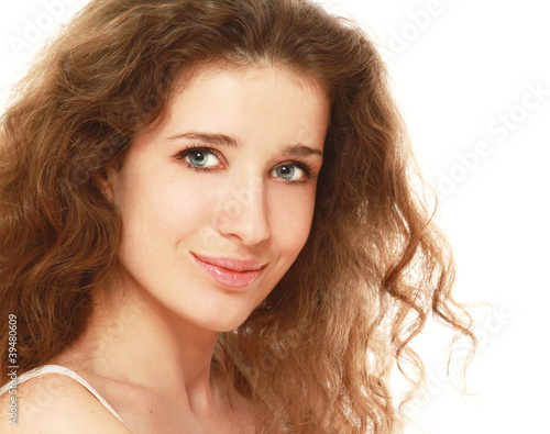 Close-up of beautiful young woman isolated on white background