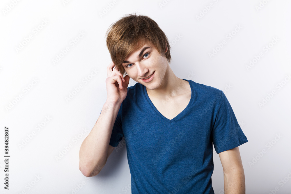 Young man with a thinking face Young man with a thinking face