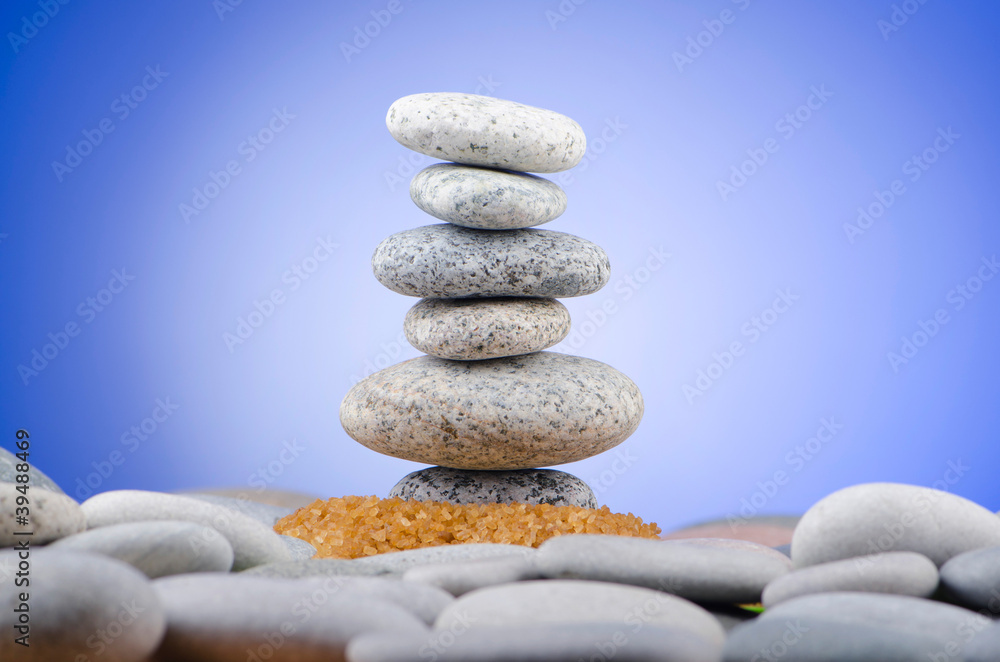 Balanced pebbles with colour background Balanced pebbles with colour background