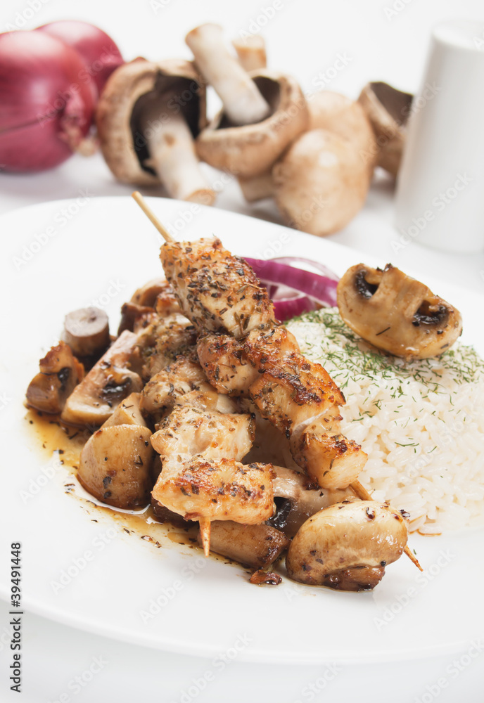Grilled chicken skewer with mushrooms and rice Grilled chicken skewer with mushrooms and rice