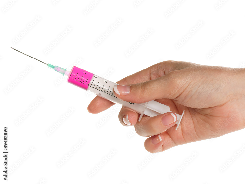 Hand with syringe Hand with syringe