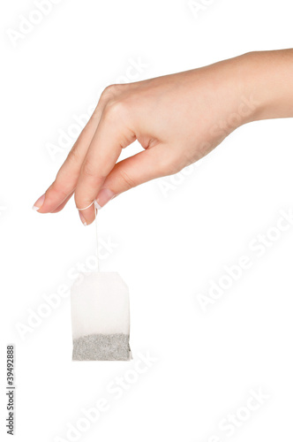 Tablou pe pânză Hand with teabag
