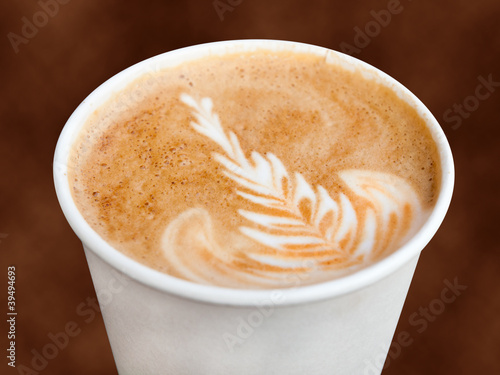 Cappuccino in a takeaway cup © Alex Hubenov