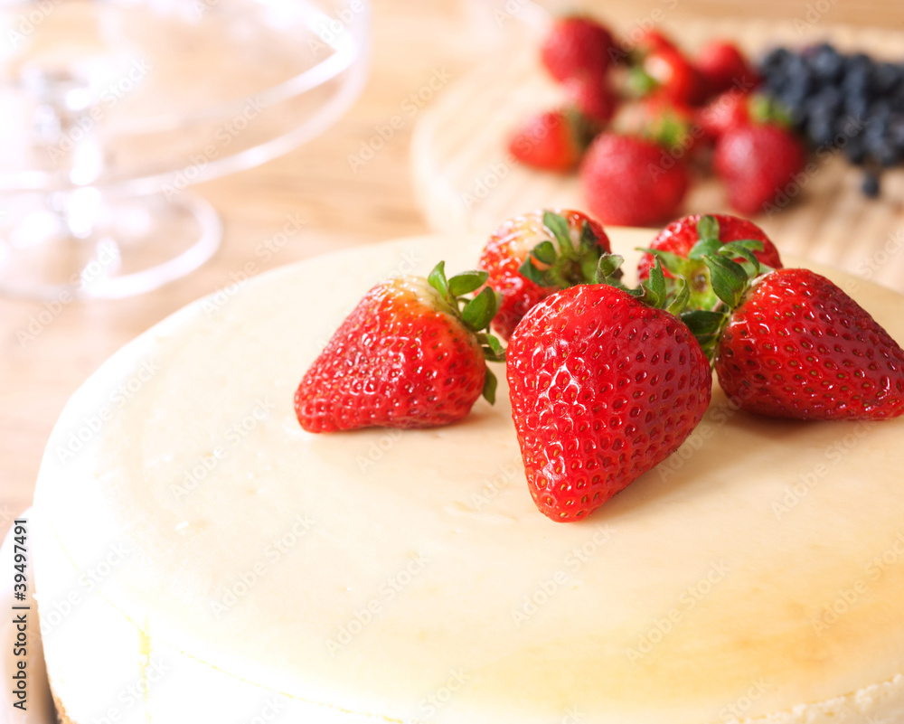 cheesecake topped with strawberries cheesecake topped with strawberries