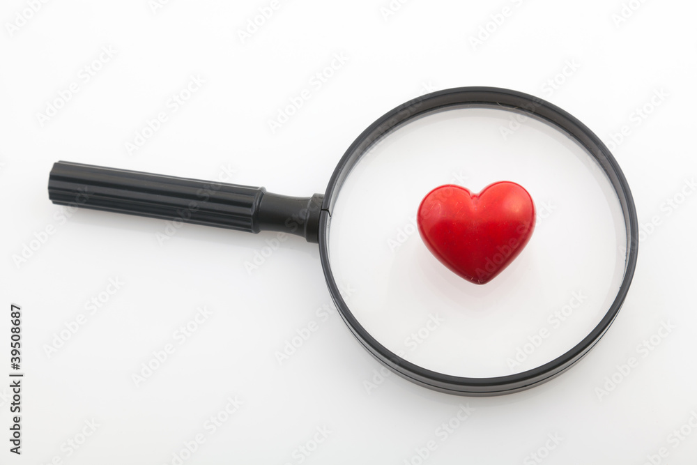 Magnifying glass & red heart Magnifying glass & red heart