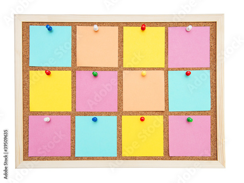 Corkboard with pinned many blank postit isolated on white background