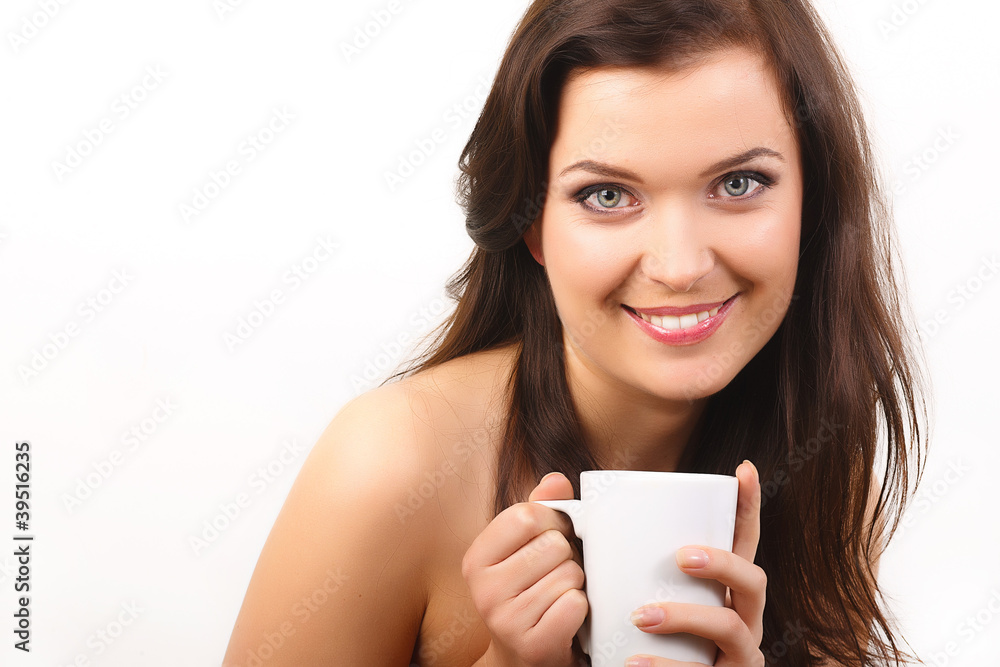 young beautiful woman with a white cup of tea or coffee young beautiful woman with a white cup of tea or coffee