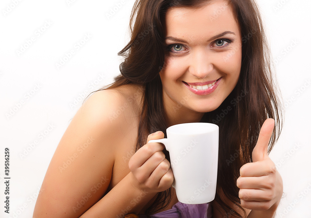 young beautiful woman with a white cup of tea or coffee young beautiful woman with a white cup of tea or coffee