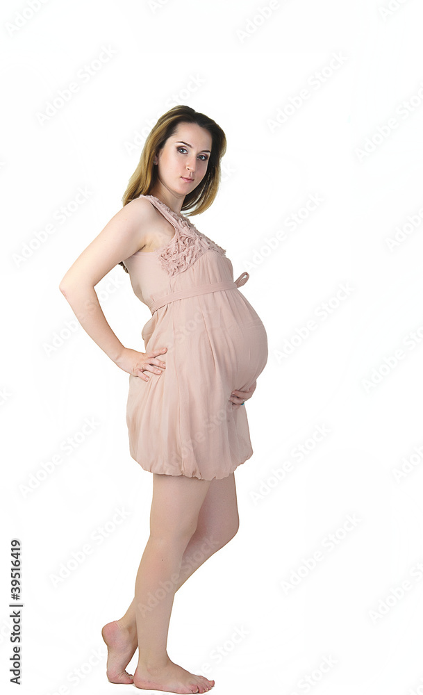 beautiful pregnant woman on white background. 7 months