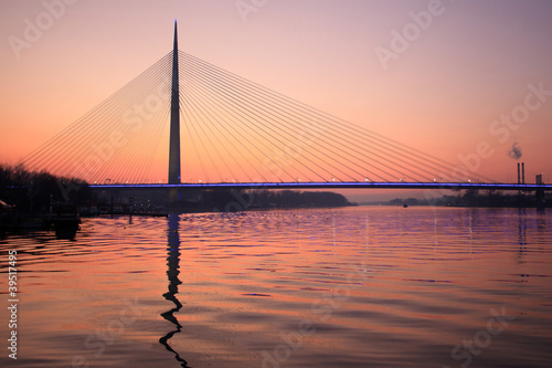 cable bridge Ada in sunset