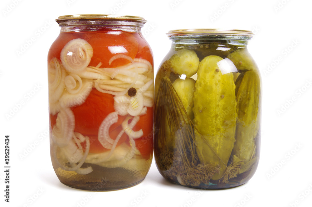 Pickled cucumber and tomato in glass Pickled cucumber and tomato in glass