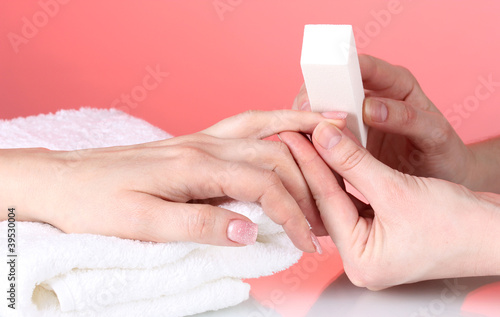 Manicure process in salon